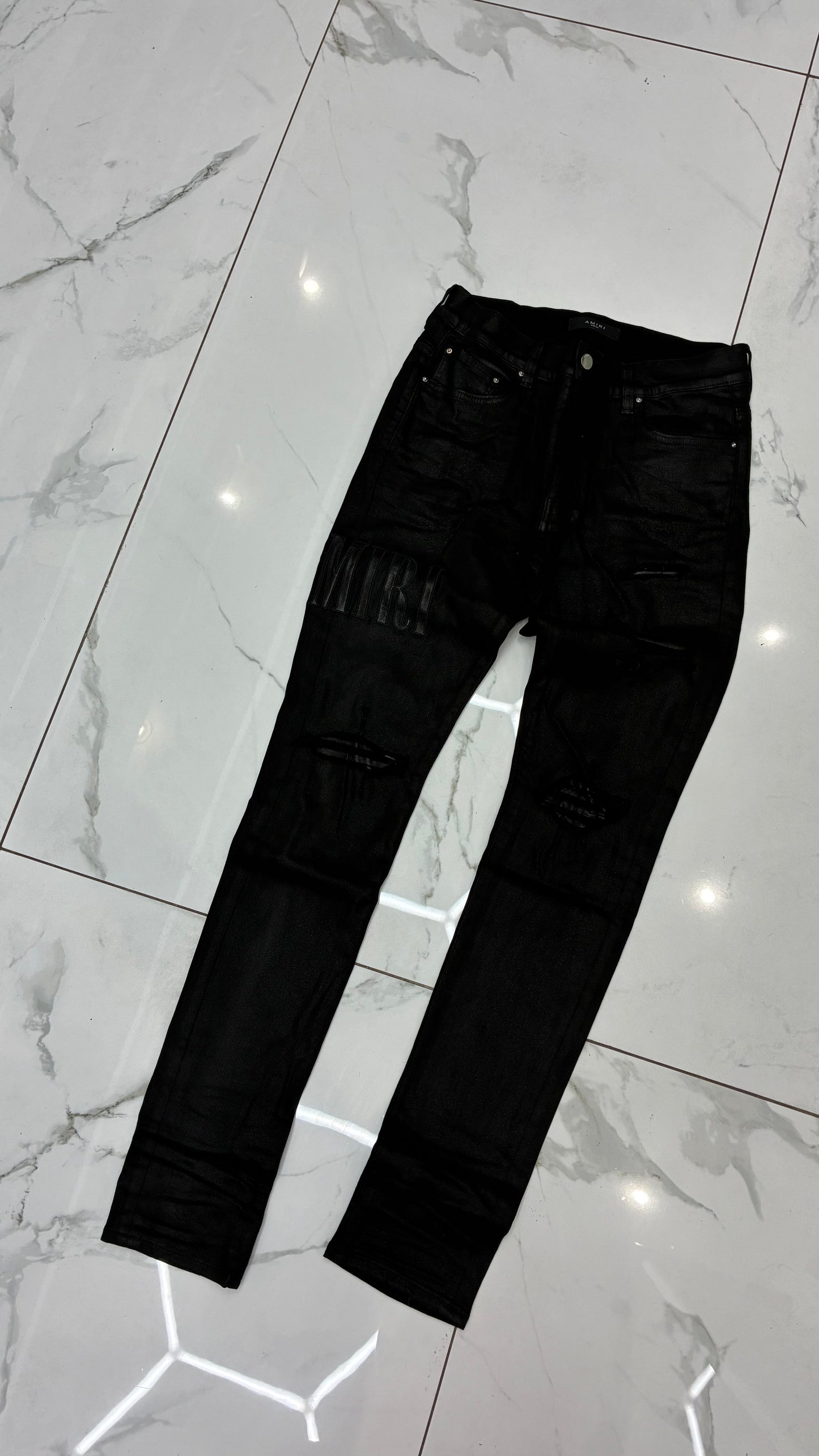 AMIRI BLACK WAX JEAN AMIRI LOGO PATCH